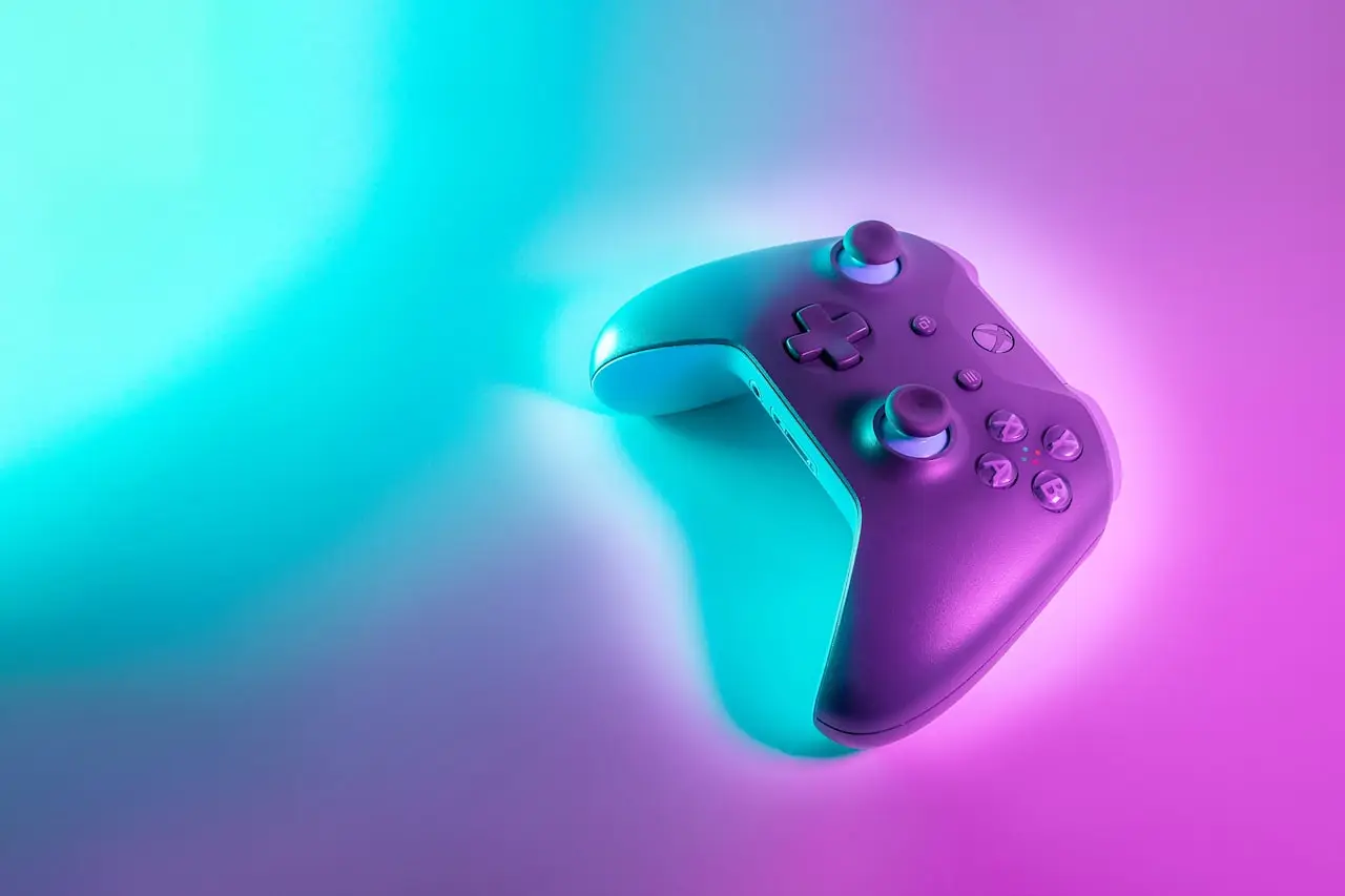 Handheld console charging on a desk